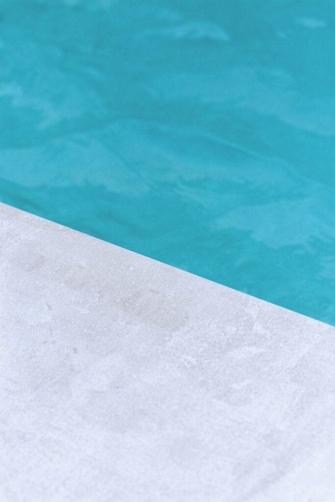 empty gray floor beside pool